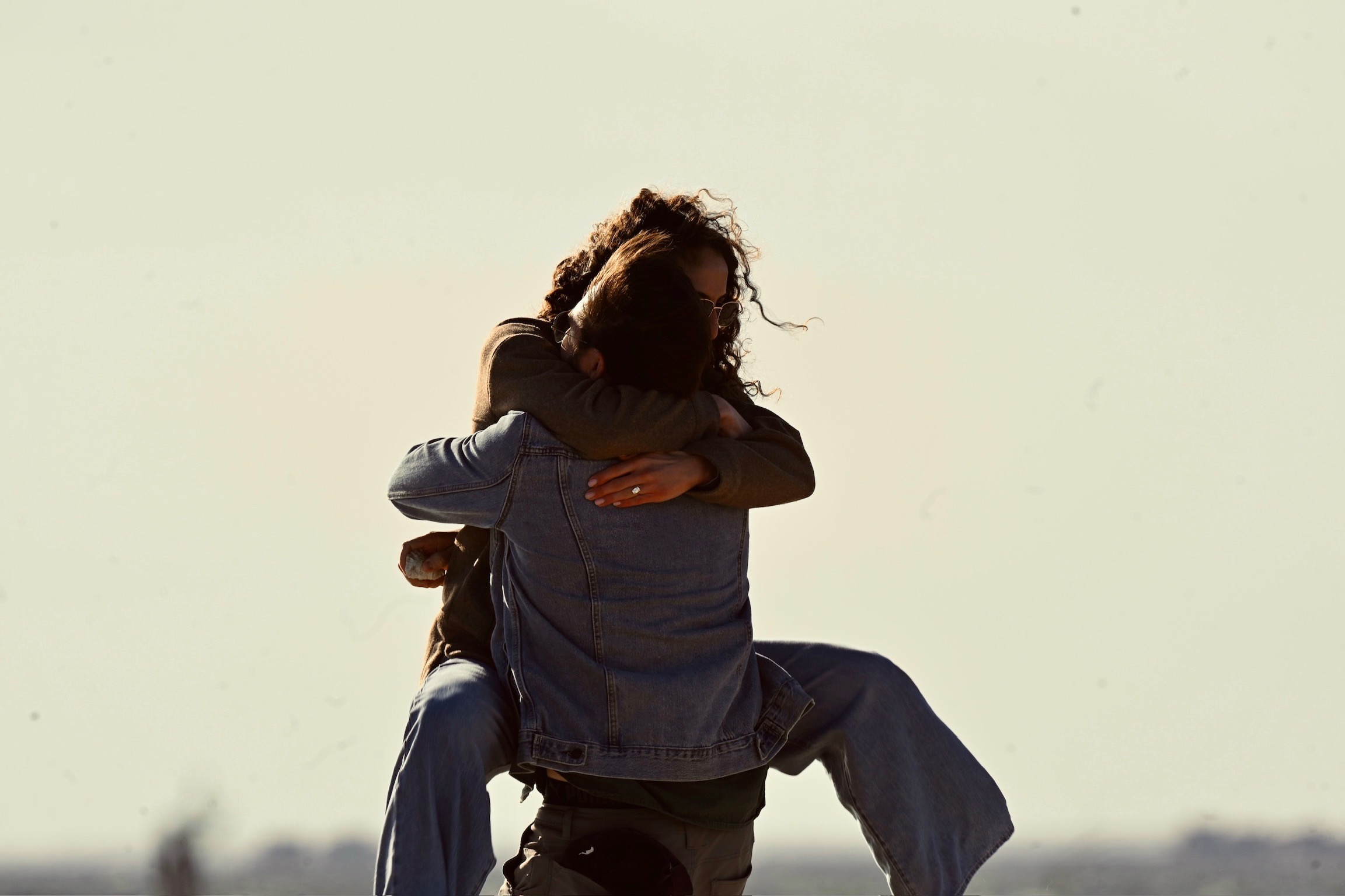 Eric lifts Mary after she says yes